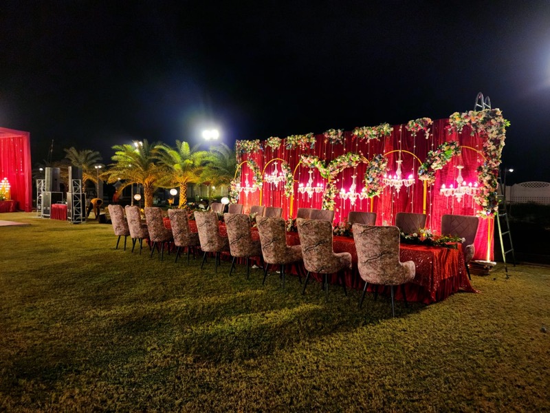Wedding venue decoration with lighting and draping